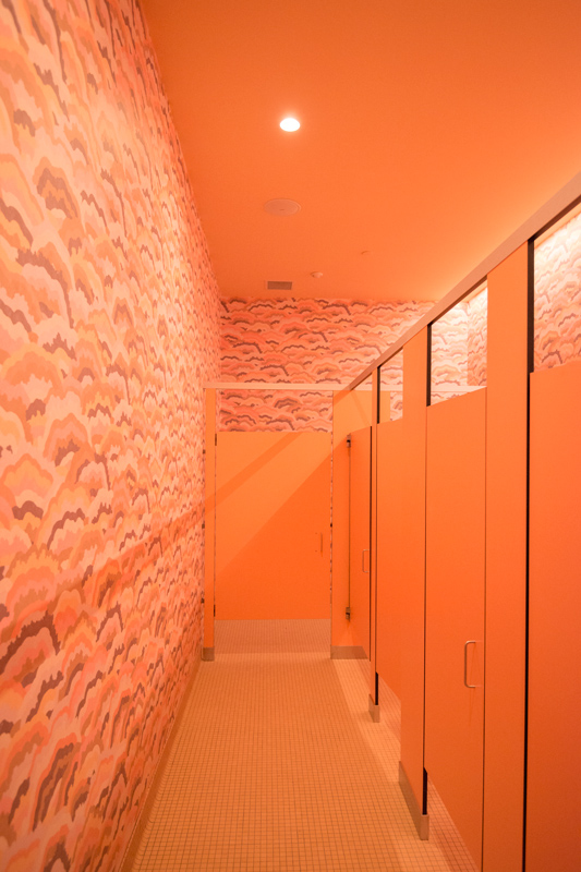 A tangerine dream bathroom perfect for a selfie moment