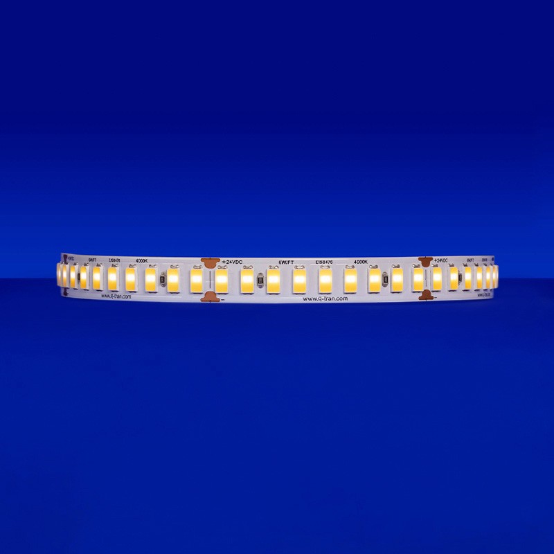 Close-up view of the SW-HE+24/3.0 LED strip radiating a 3000K warm light intensity at 587 lm/ft, showcasing its 9 diodes spaced evenly within a 2-inch segment.